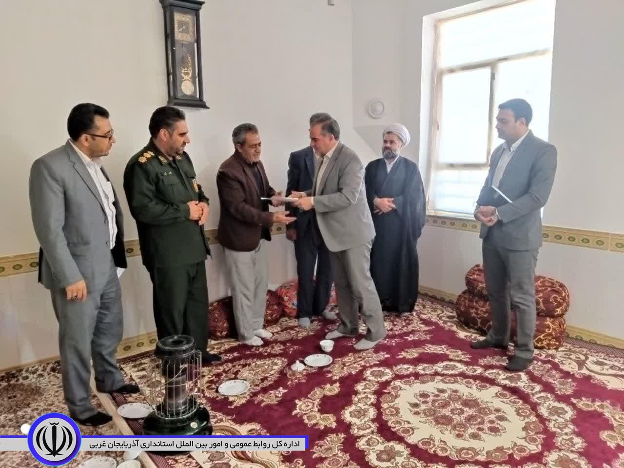تجلیل از خانواده شهید شهید والامقام بخشی در روستای نختالو